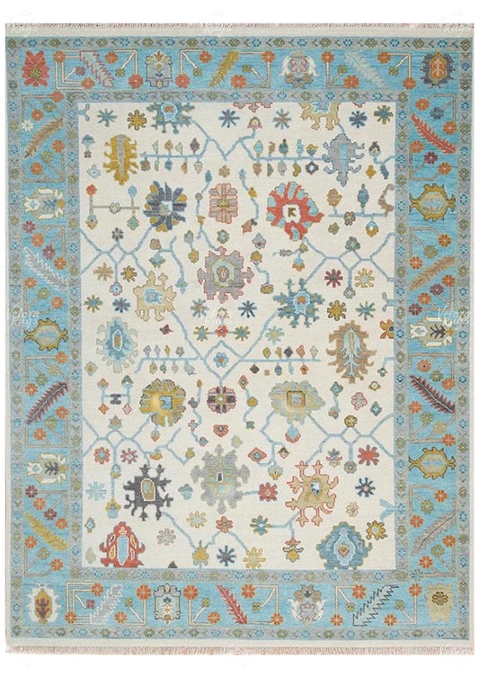 Hand-Knotted Oushak Wool Rug: Ivory, Sky Blue, and Rust Accent