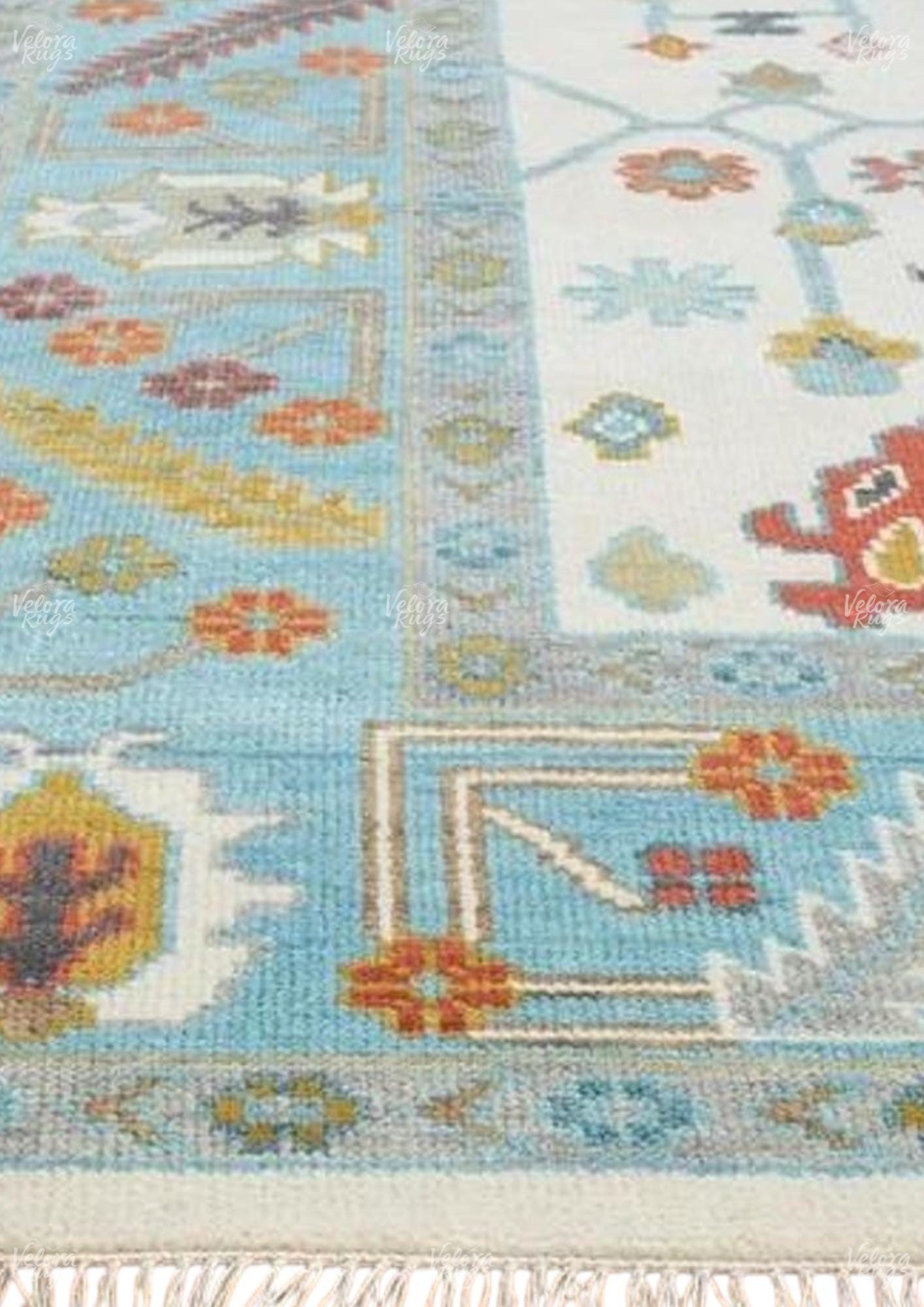 Hand-Knotted Oushak Wool Rug: Ivory, Sky Blue, and Rust Accent