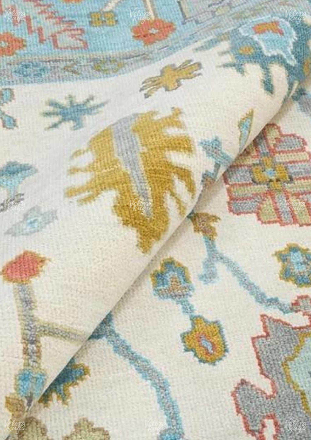 Hand-Knotted Oushak Wool Rug: Ivory, Sky Blue, and Rust Accent